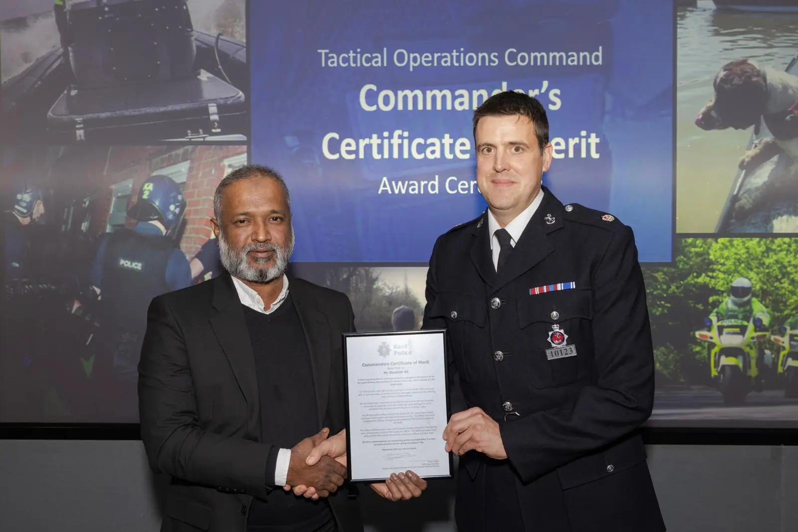 Ibrahim Ali, Larkfield taxi driver, receiving the National Commanders Certificate of Merit for performing life-saving CPR on a passenger in Kent